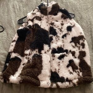 Cow print vest size small. Unknown brand
